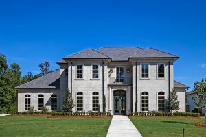 This French Provincial home is a 2-story custom built home that is located close to New Orleans.