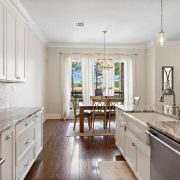 Lovely kitchen with stainless appliances and solid surfrace counters.