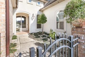 The courtyard entry is a private enterance that welcomes you into this home.