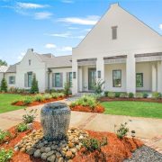 This home is beautiful and sits on a huge 4.4 acre lot with a pond.