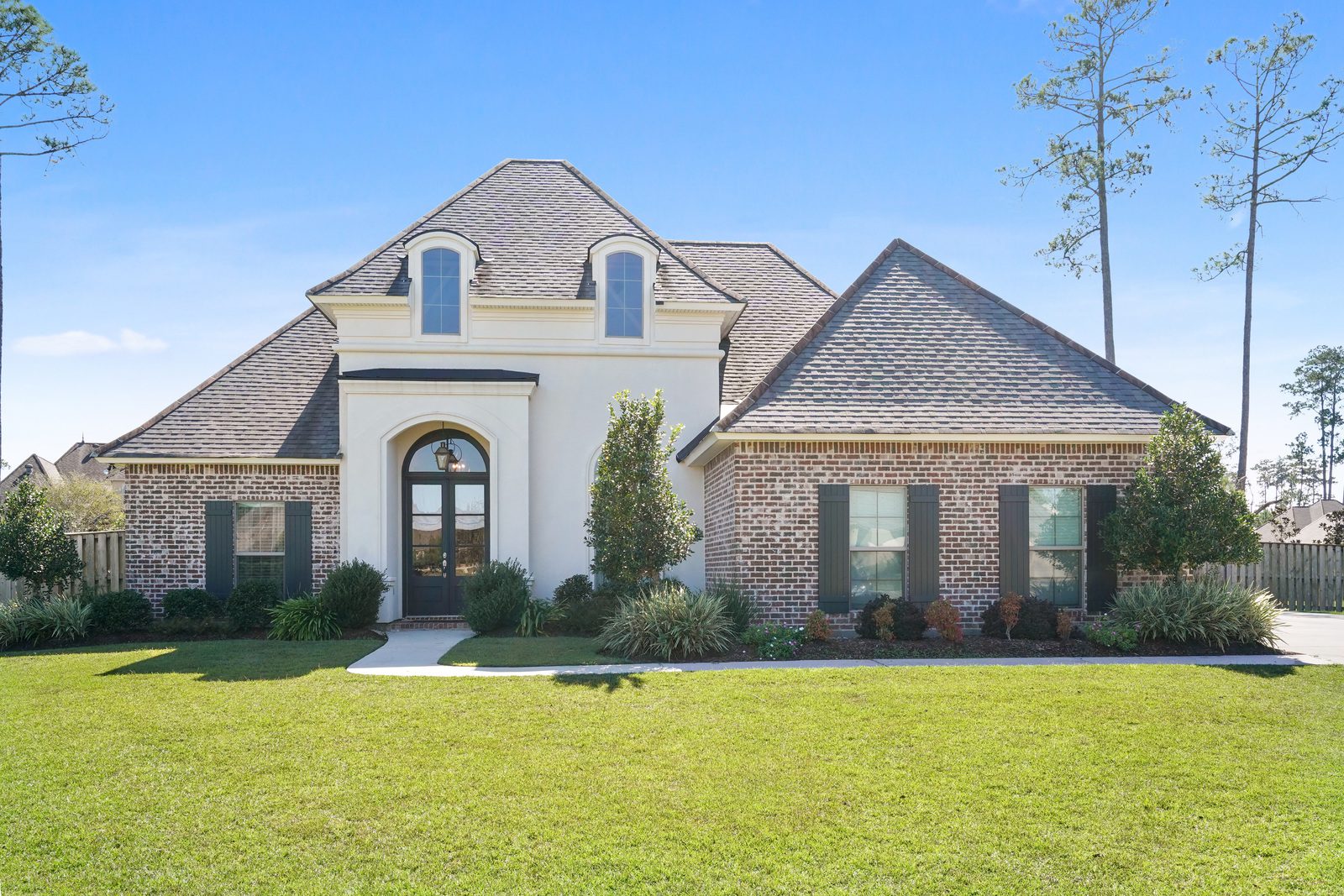This home is fully landscaped and is located close to New Orleans. This home is built by a custom builder in a master planned community.