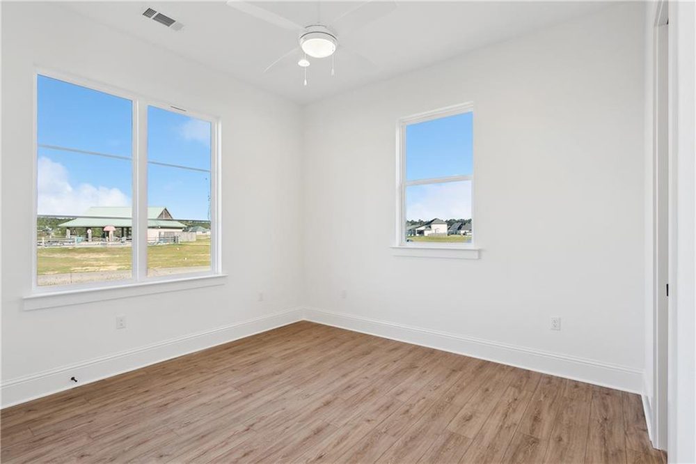 22-Flex Space 1174 Audubon Pkwy Ideal as a bedroom, guest room, or home office, this versatile space is ready for personal touches and furnishings, offering both comfort and serene charm.