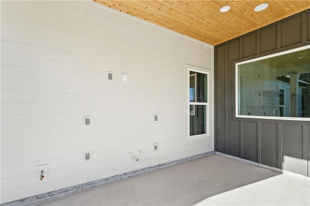 30-Covered Patio 1174 Audubon Pkwy Whether you're dreaming of a built-in grill, bar, or lounge seating, this versatile space is a blank canvas with endless potential.