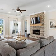 This home features custom lighting and hardwood floors.